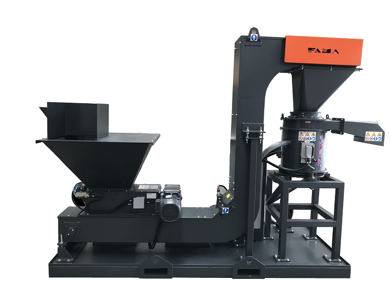 Compact unit for shredding and centrifuging metal swarfs directly under the machine.